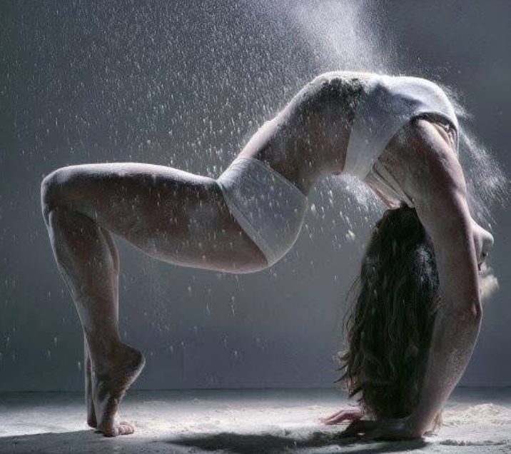 Lowri Rhiannon in a dramatic contortion pose by photographer Dan Pickard